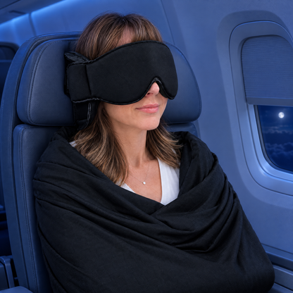 Resting on a night flight with the NestAway mask and wrap